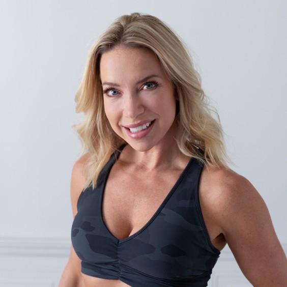Kate Willis in workout wear, smiling